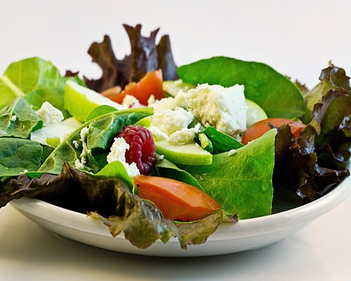 A colorful plate of fresh vegetables and local food